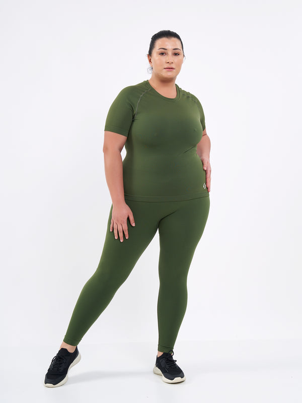 Color_Forest Green | A Women Wearing Zen Khaki Color Zen Confidence Seamless Compressive Leggings. Body-Shaping