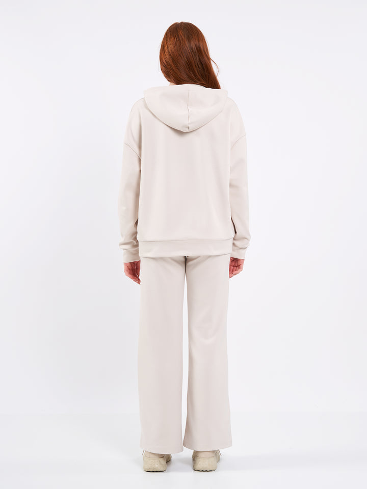 A Woman Wearing White Sand Color Durable Oversized Comfort Hoodie for All-Day Wear