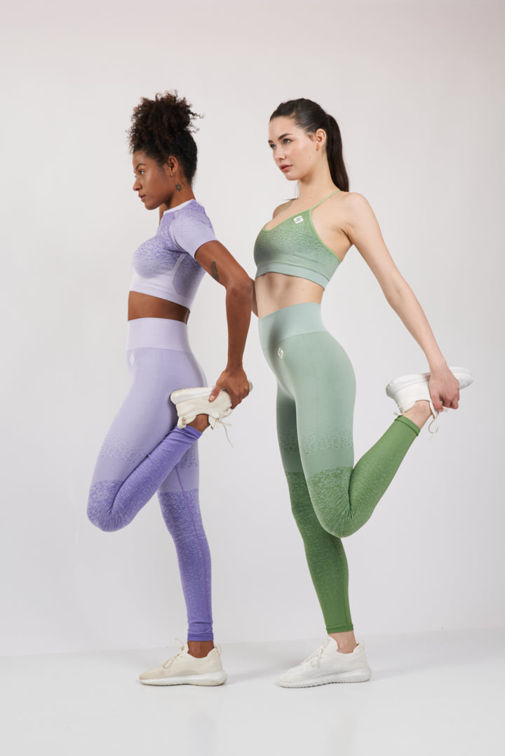 A Women Wearing Misty Green Color Seamless High-Waist Leggings with Ombre Effect. Chic Comfort