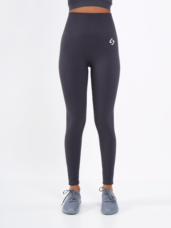 Color_Stone Coal | A Woman Wearing Stone Coal Color Zen Perfect Seamless High-Waist Ankle-Length Leggings. Perfect Fit