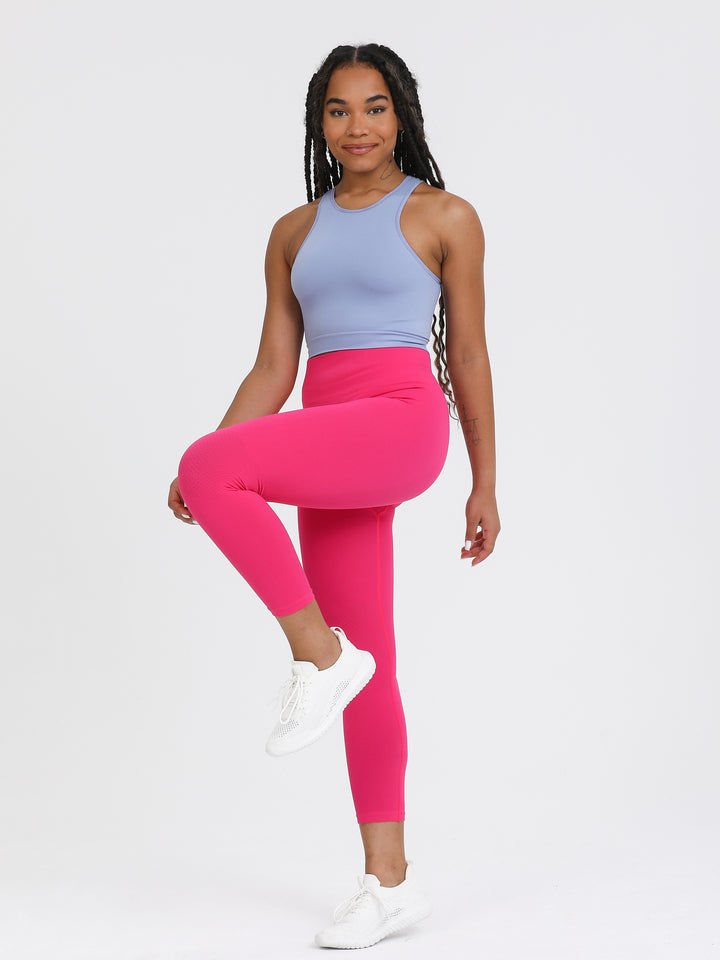 A Woman Wearing Beetroot Color Seamless Full-Length Legging