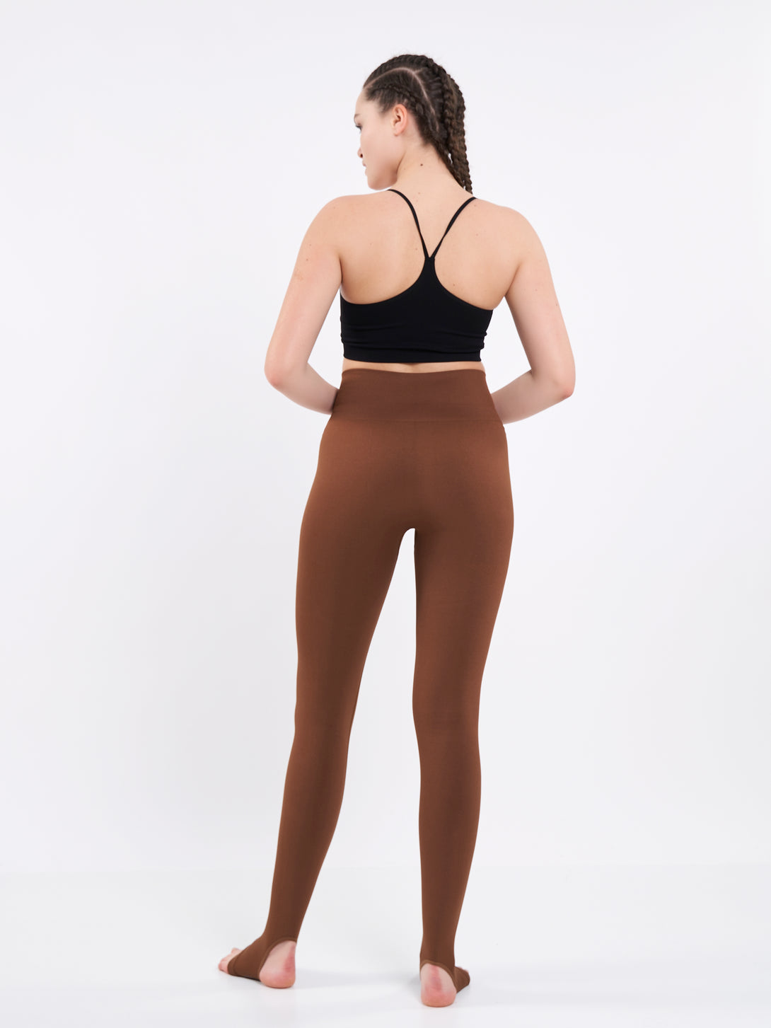 A Woman Wearing Toffe Brown Color Seamless High-Waist Anti-Slip Yoga Leggings. Super Flexible