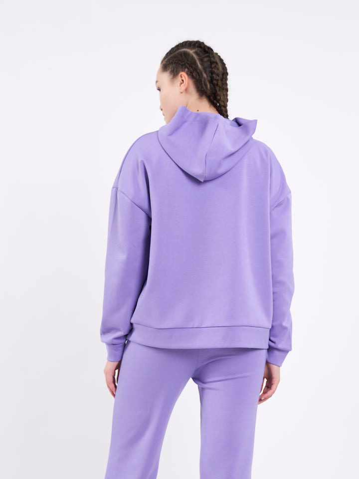 A Woman Wearing Lavender Fields Color Durable Oversized Comfort Hoodie for All-Day Wear