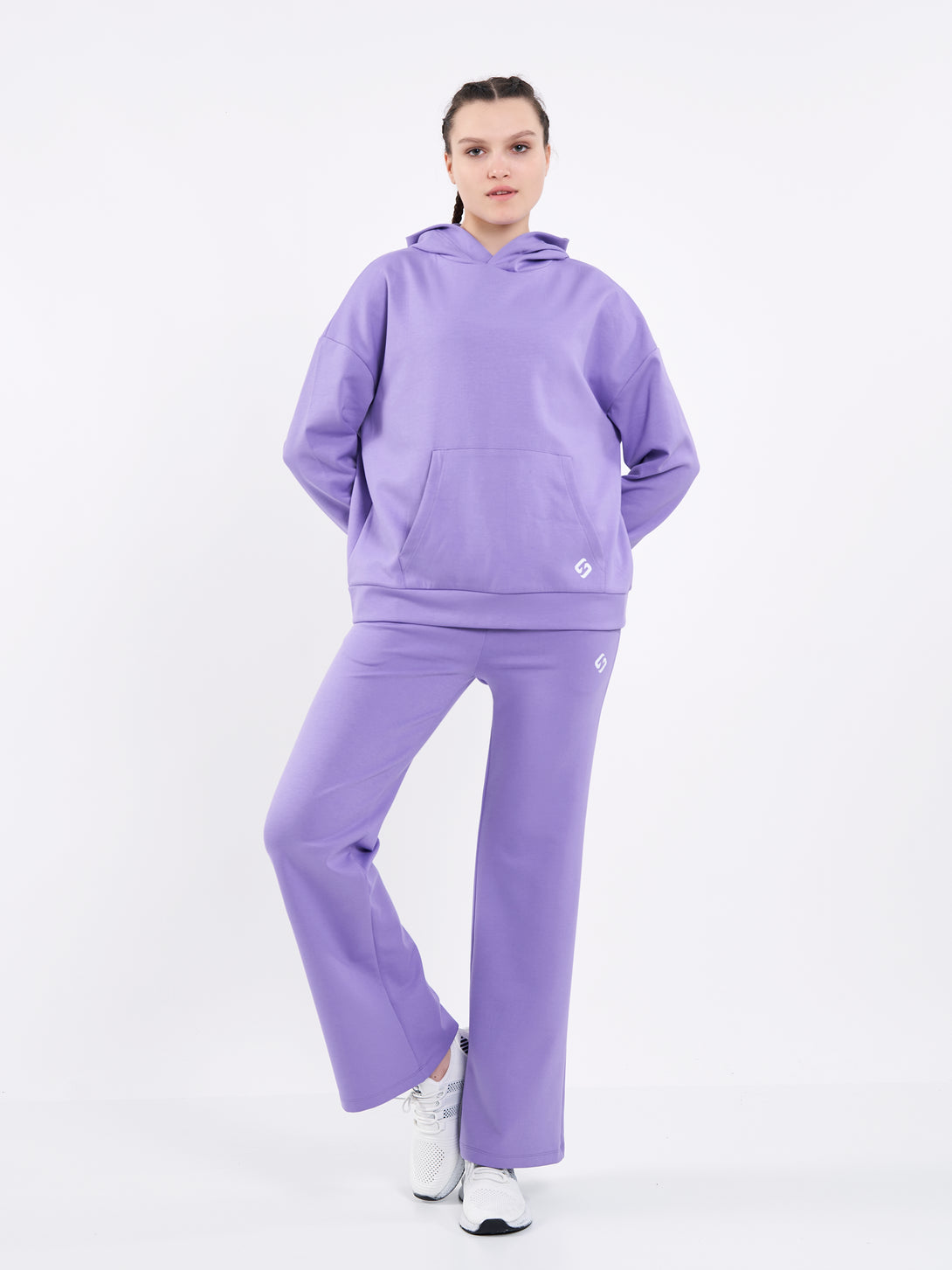 A Woman Wearing Paisley Purple Color Durable Oversized Comfort Hoodie for All-Day Wear