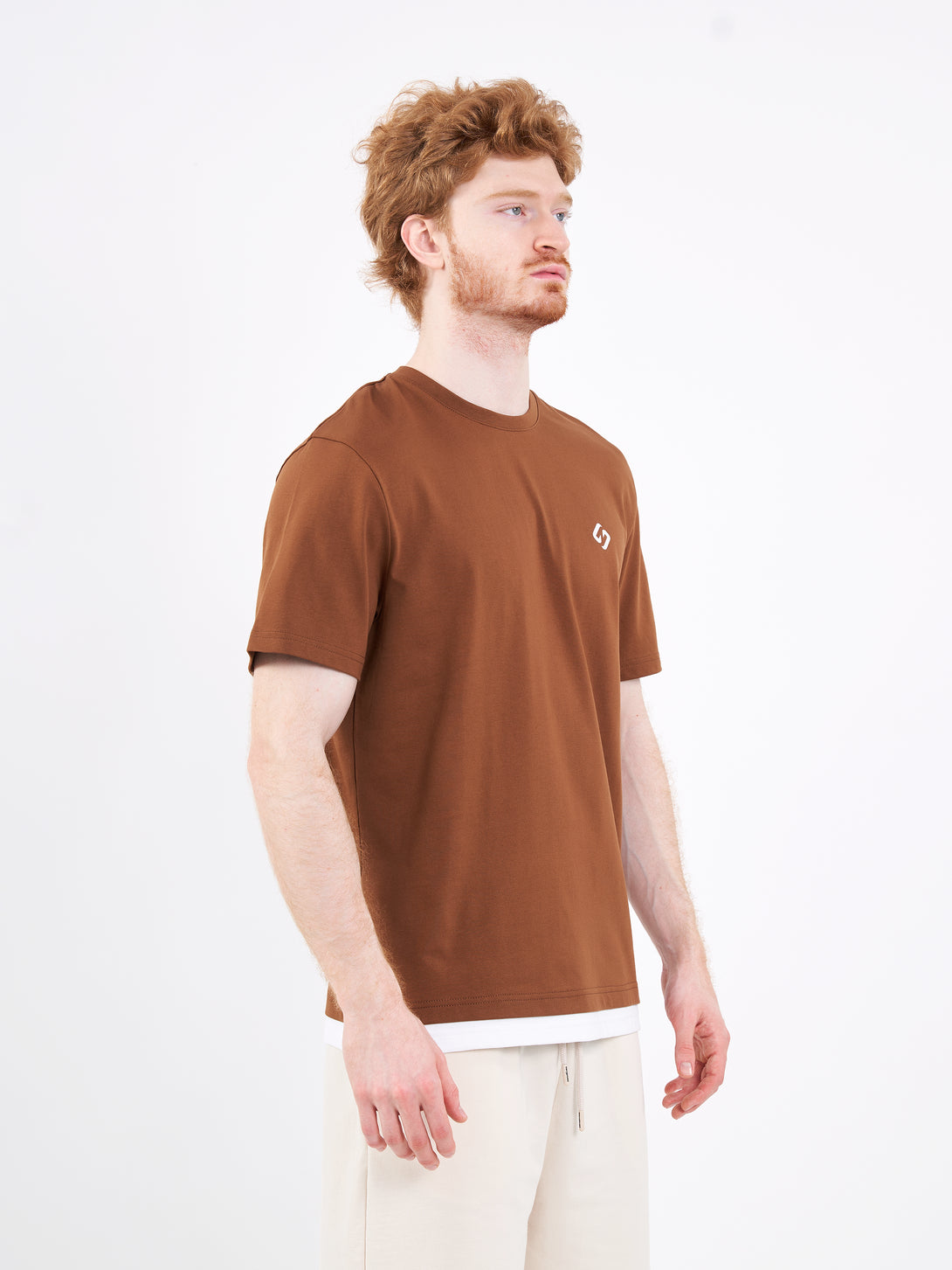 A Man Wearing Toffe Brown Color Men's Layered Heavyweight Crew Neck T-Shirt. Regular Fit