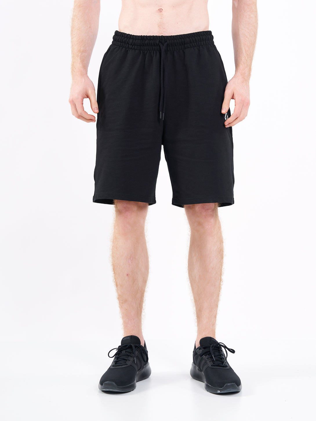 A Man Wearing Deep Black Color Men's Easy-Fit Shorts for All-Day Wear