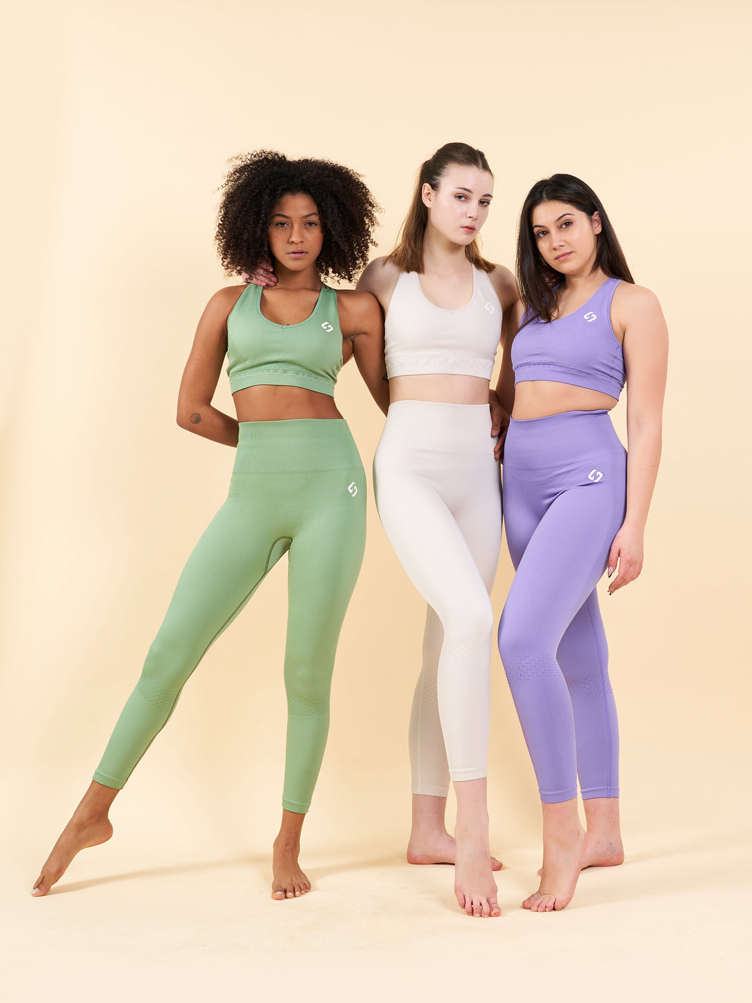 A Woman Wearing Paisley Purple Color Seamless High-Waist Ankle-Length Ribbed Leggings. Super-Soft