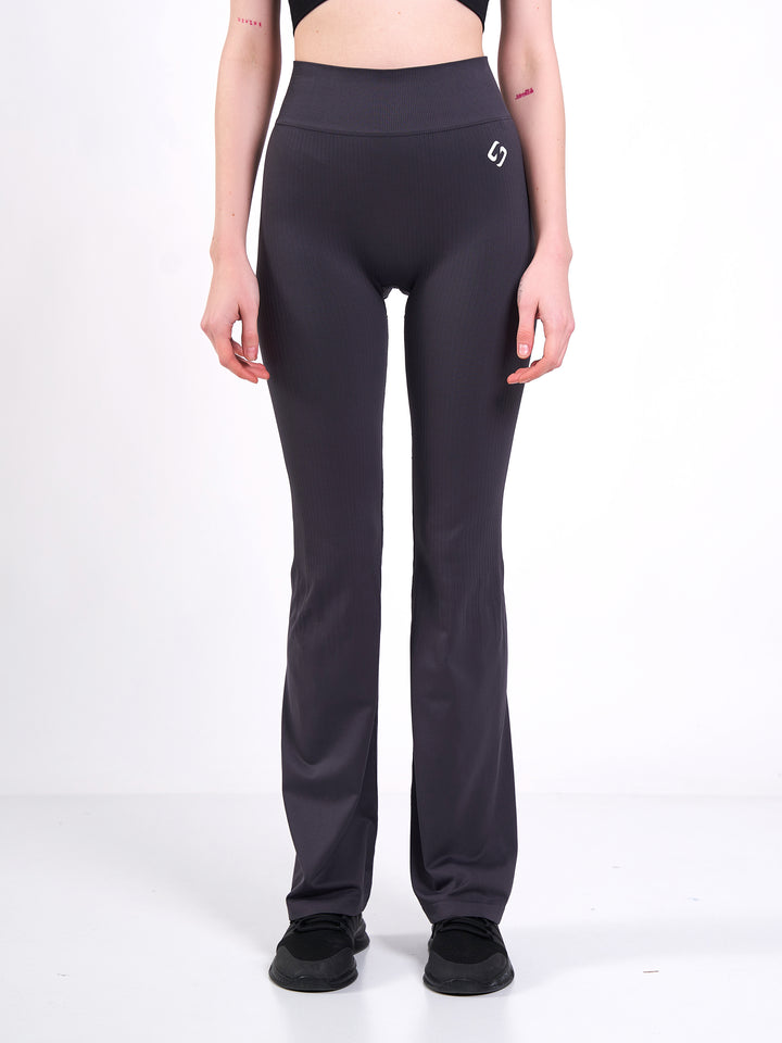 A Woman Wearing Anthracite Color Antigravity Seamless Flare-Leg Yoga Pants. Ultra-Light