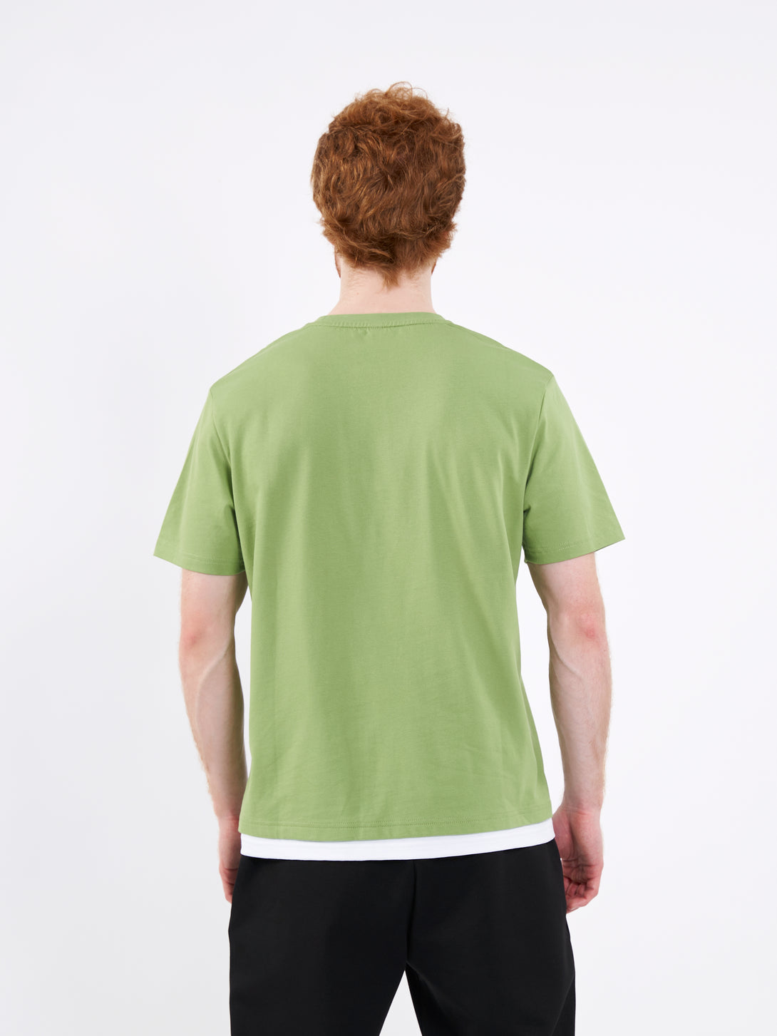 A Man Wearing Mist Green Color Men's Layered Heavyweight Crew Neck T-Shirt. Regular Fit