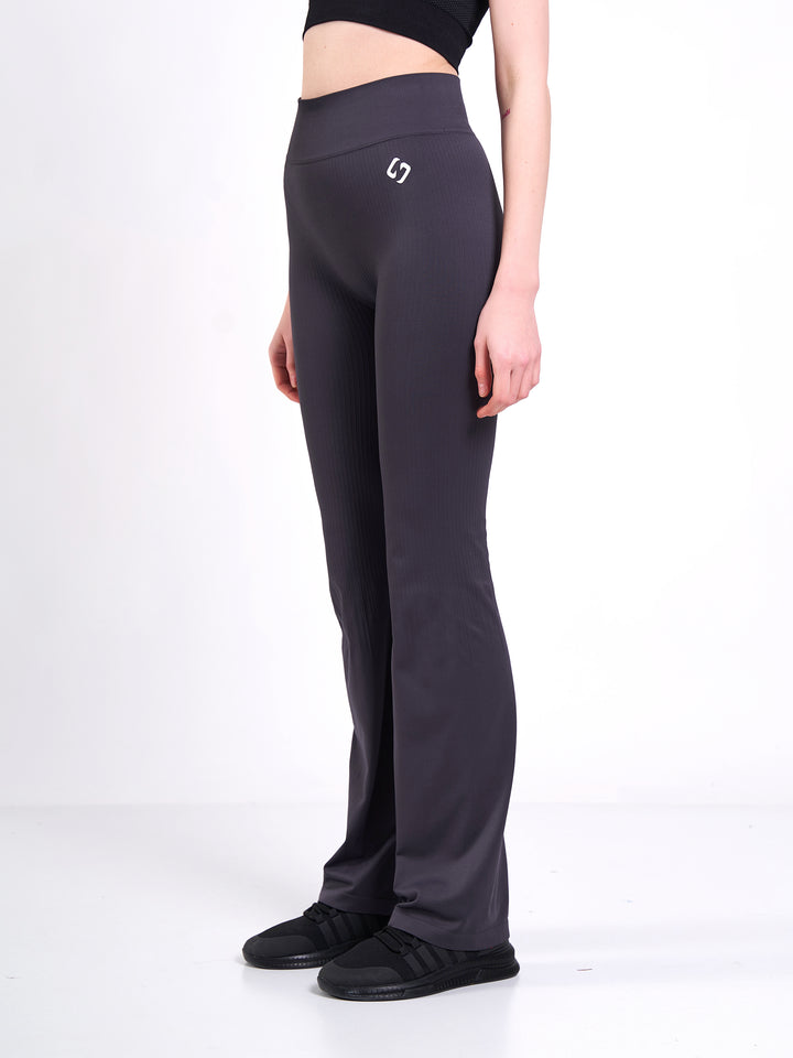 A Woman Wearing Anthracite Color Antigravity Seamless Flare-Leg Yoga Pants. Ultra-Light