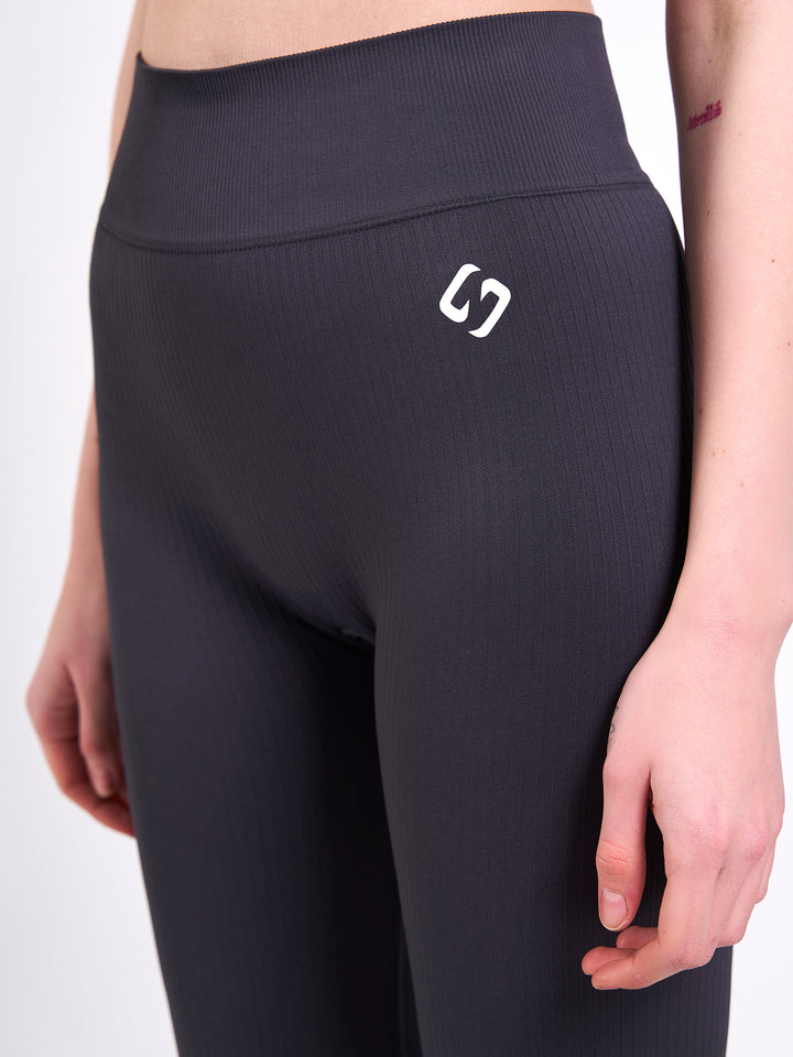 A Woman Wearing Anthracite Color Antigravity Seamless Flare-Leg Yoga Pants. Ultra-Light