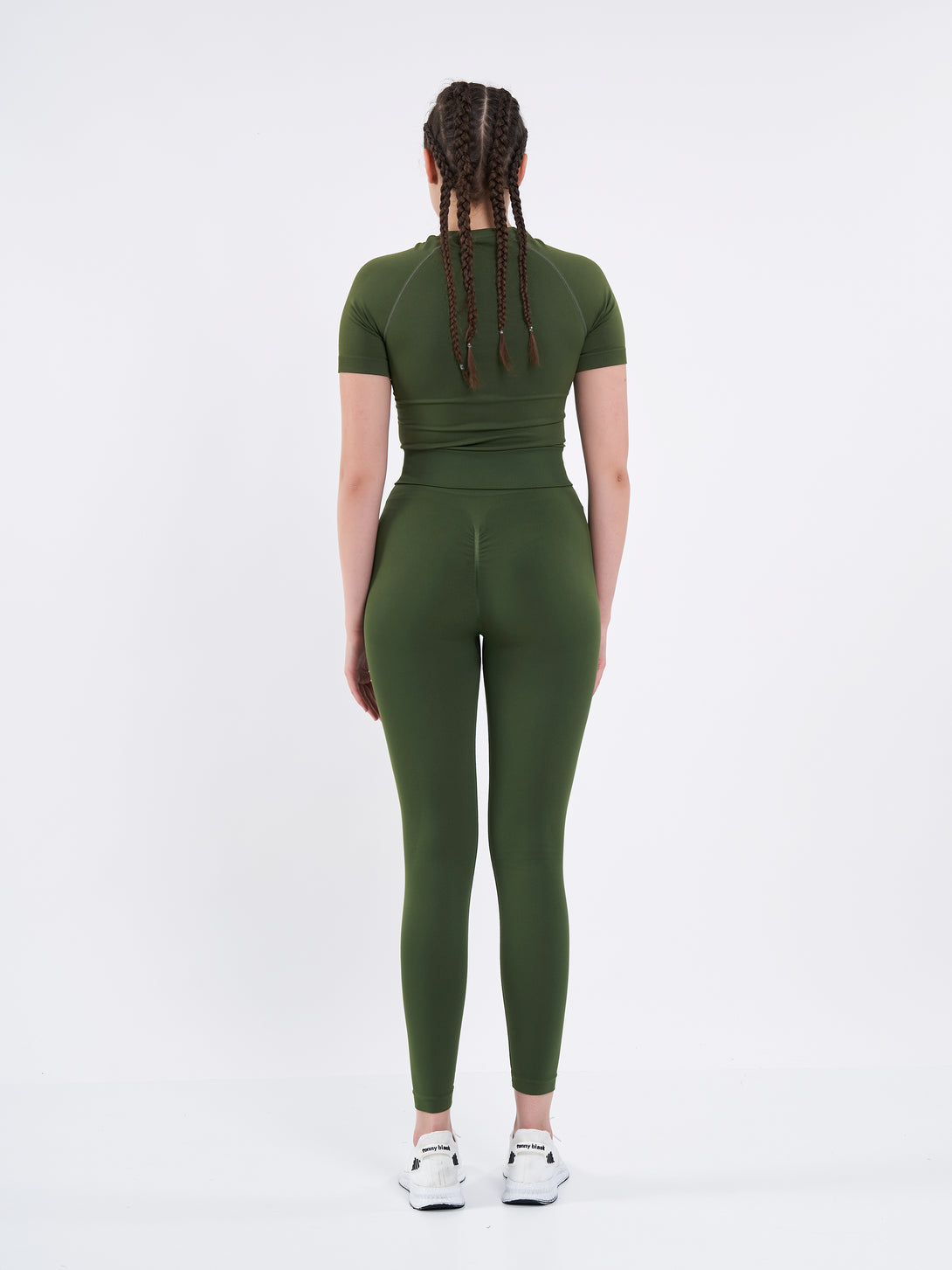 A Women Wearing Zen Khaki Color Zen Confidence Seamless Compressive Leggings. Body-Shaping