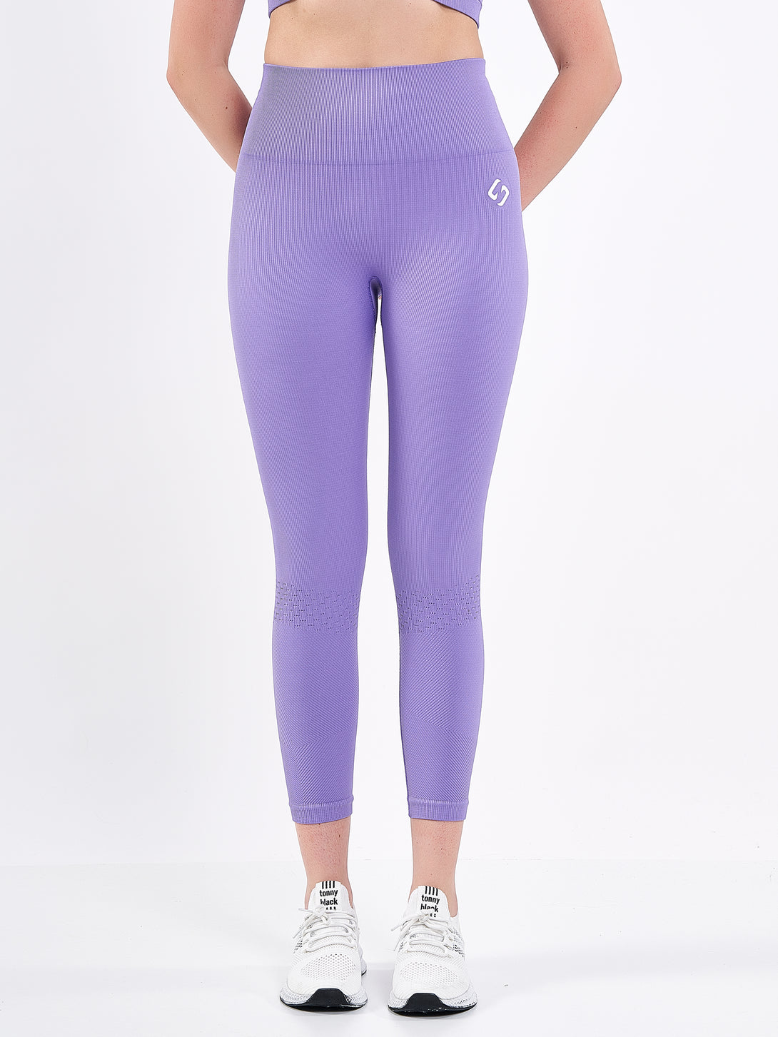 A Woman Wearing Paisley Purple Color Seamless High-Waist Ankle-Length Ribbed Leggings. Super-Soft