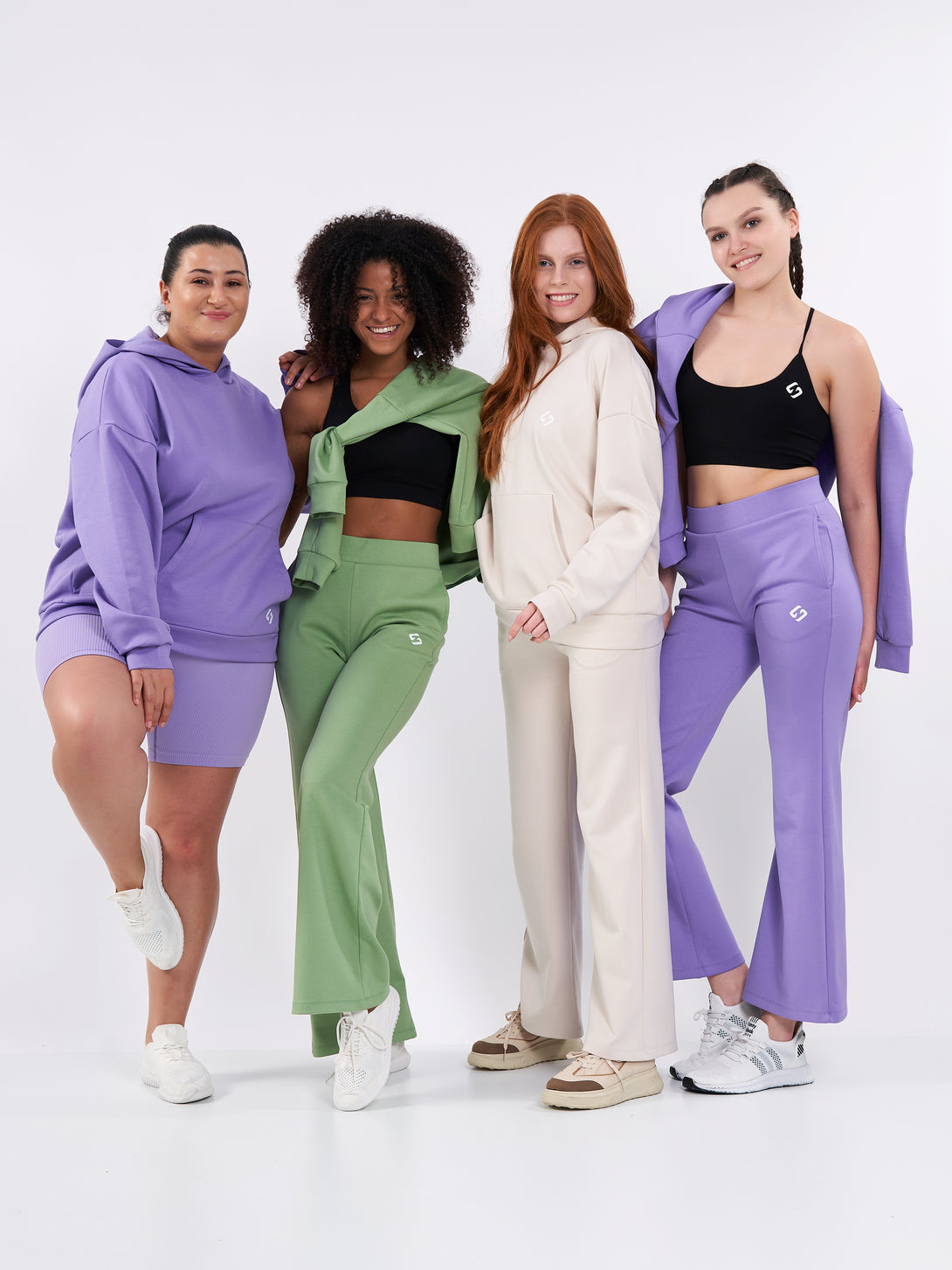 A Woman Wearing White Sand Color Durable Flare-Leg Comfort Joggers for All-Day Wear