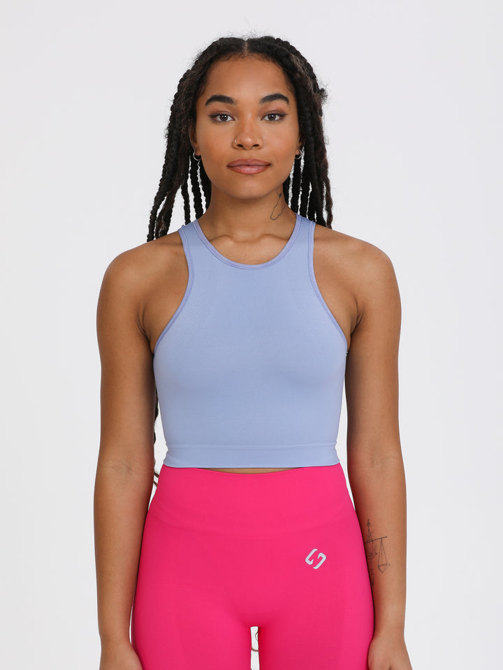 A Woman Wearing Lavender Fields Color All-Day Seamless Sleeveless Crop Top
