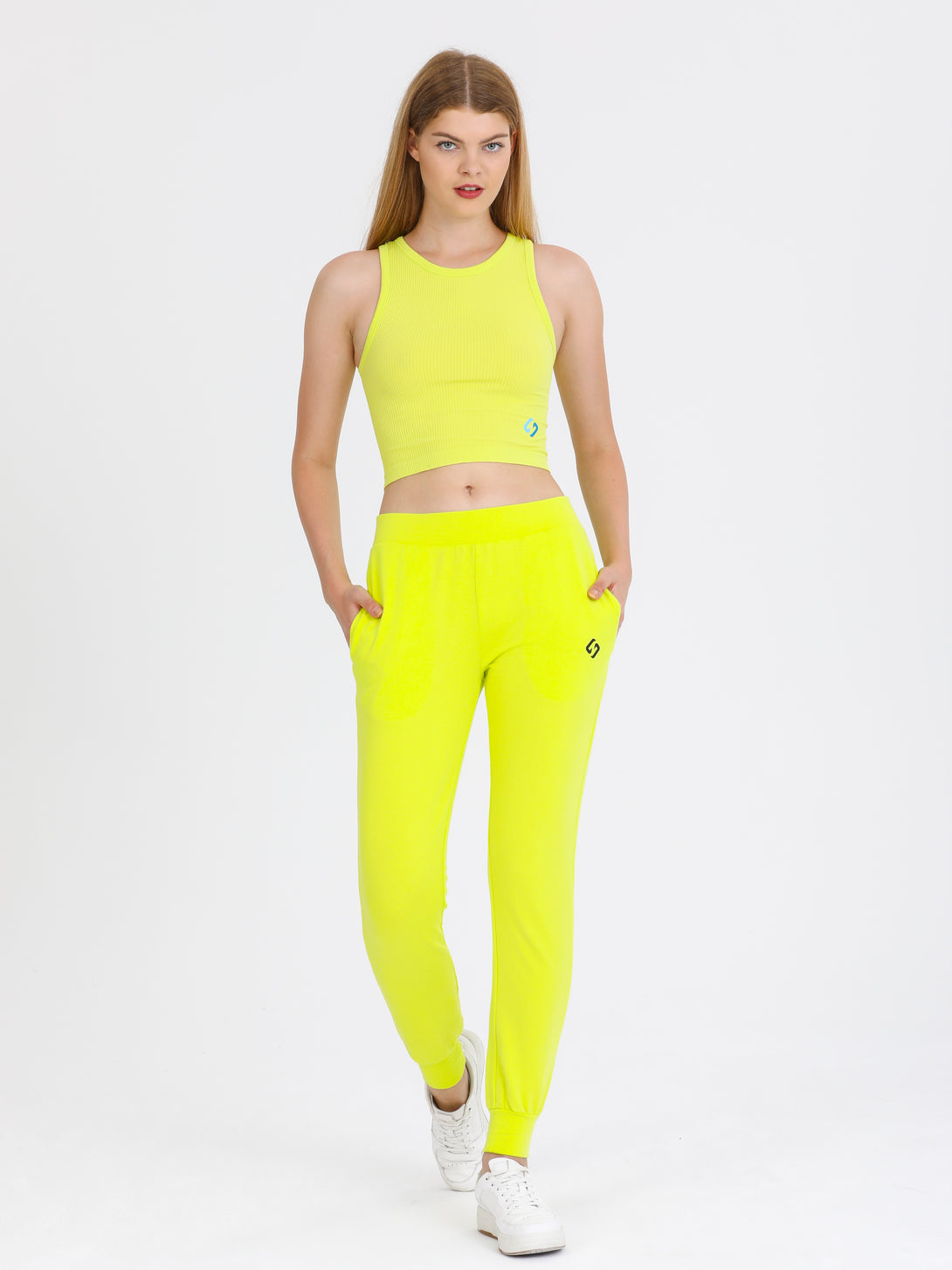 A Woman Wearing Limeade Color All-Day Sleeveless Strapped Crop Top