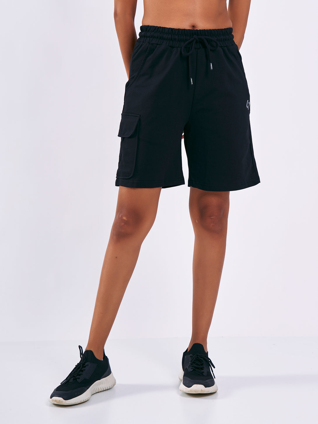 A Woman Wearing Deep Black Color Women Cargo Sweatshort