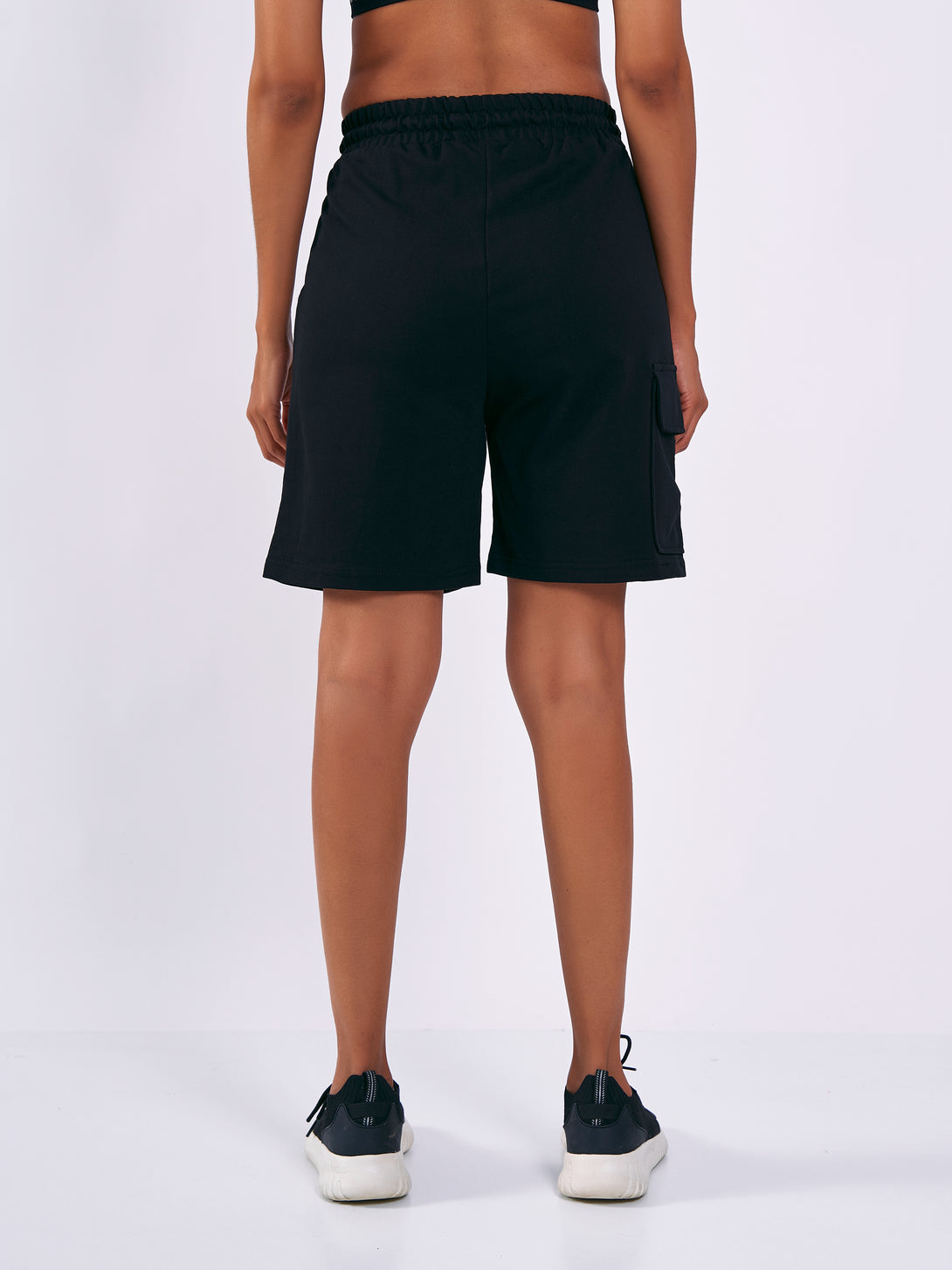 A Woman Wearing Deep Black Color Women Cargo Sweatshort