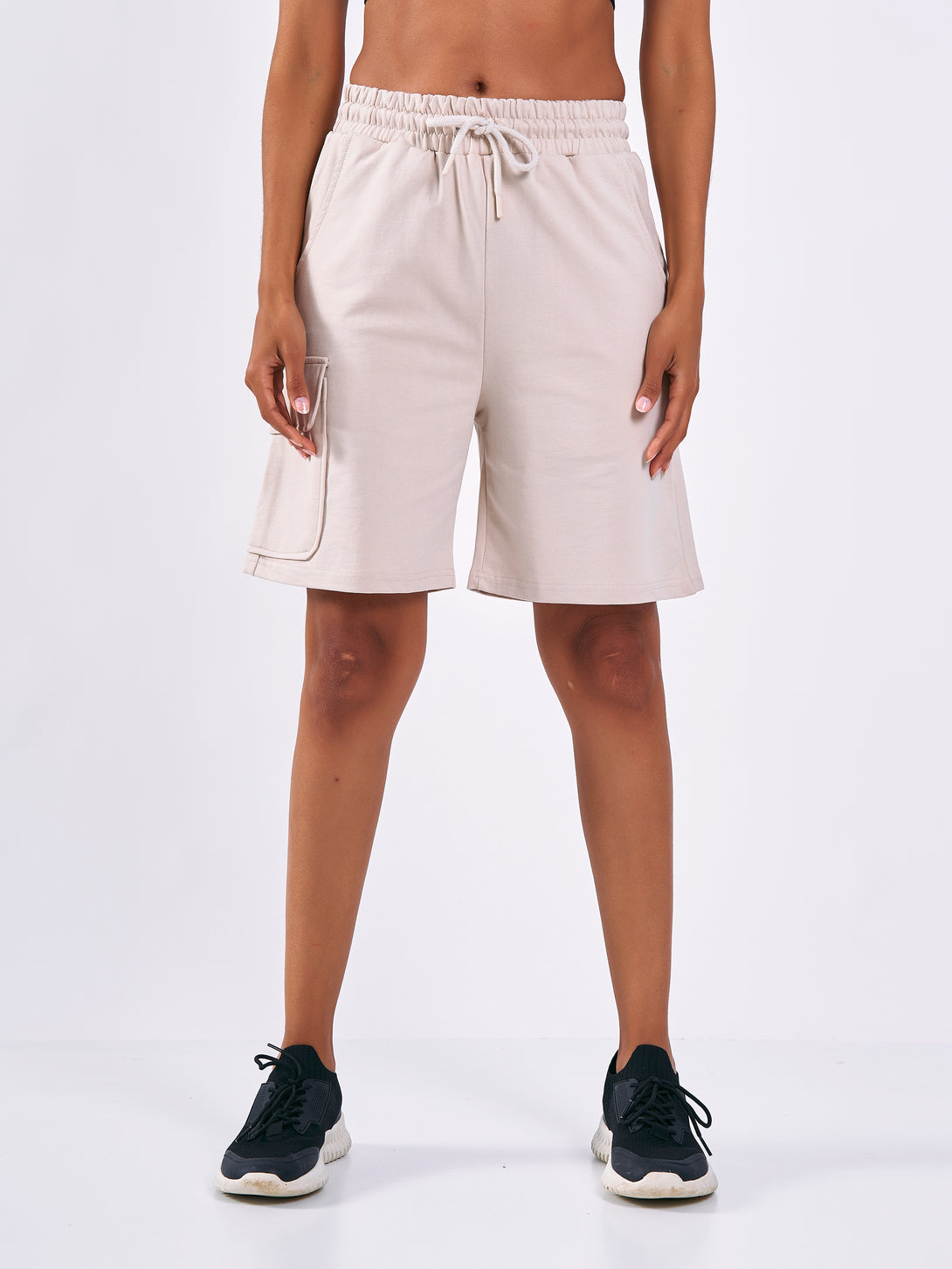 A Woman Wearing Light Beige Color Women Cargo Sweatshort