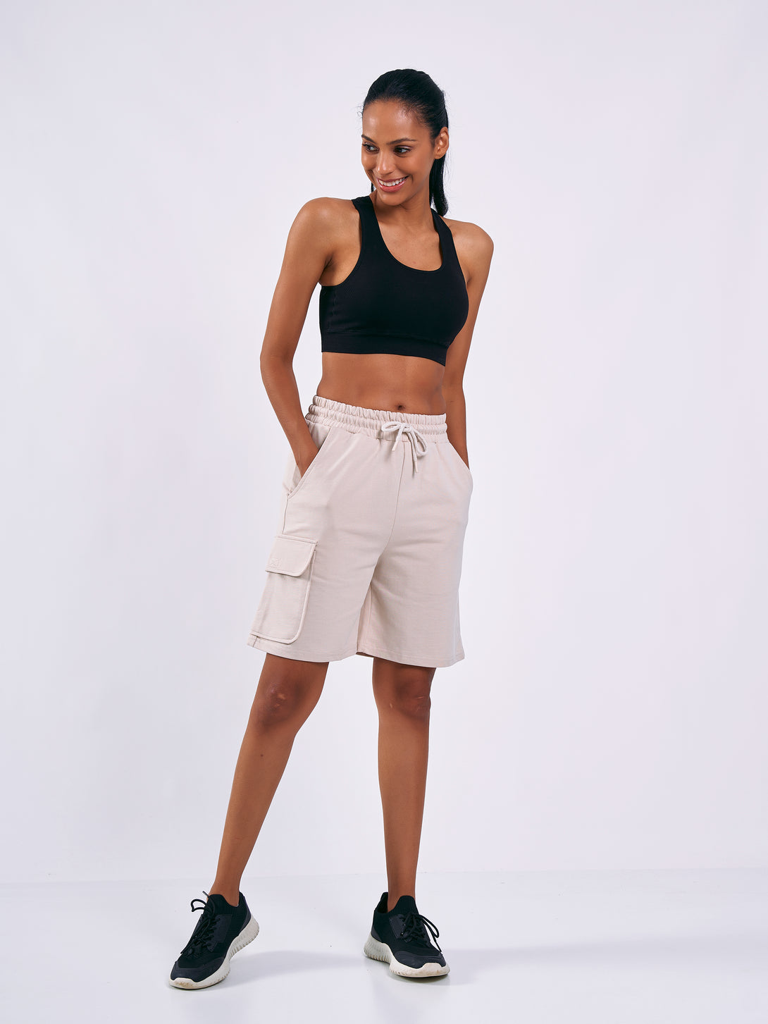 A Woman Wearing Light Beige Color Women Cargo Sweatshort