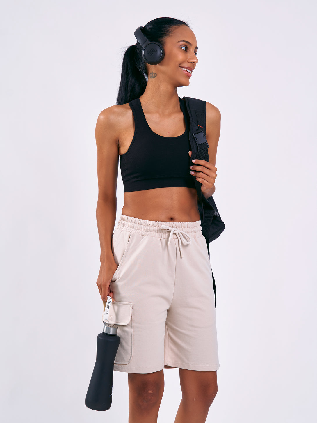 A Woman Wearing Light Beige Color Women Cargo Sweatshort