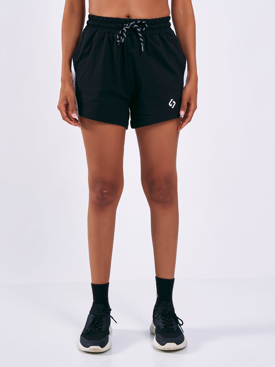 A Woman Wearing Deep Black Color Women Training Shorts 