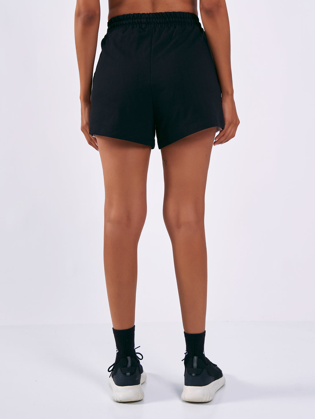A Woman Wearing Deep Black Color Women Training Shorts