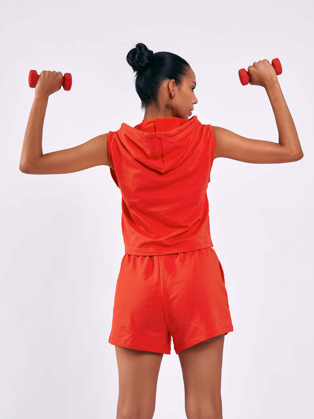A Woman Wearing Red Color Women Training Shorts