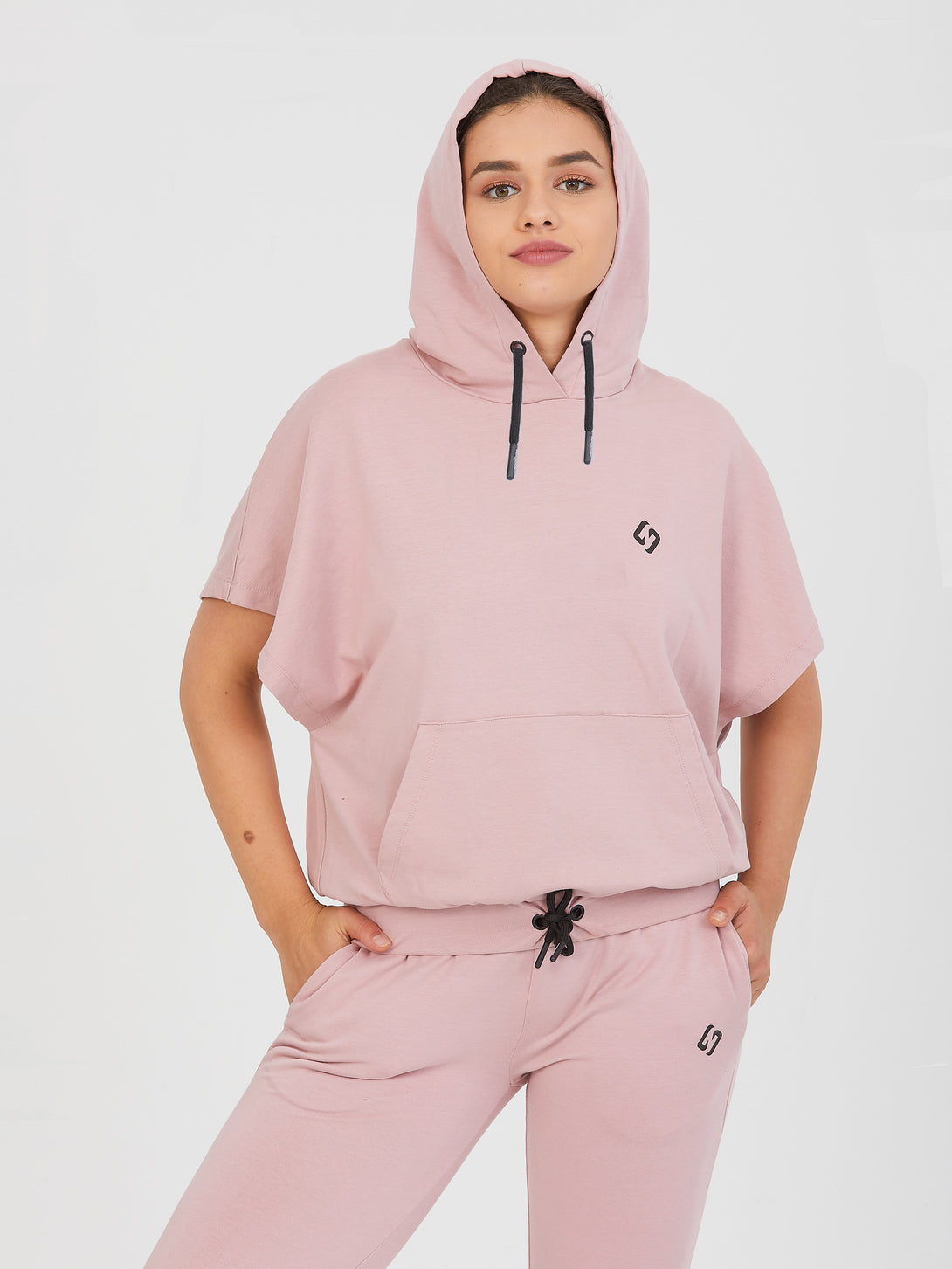 A Woman Wearing Pale Mauve Color All-Day Essential Sweatshirt