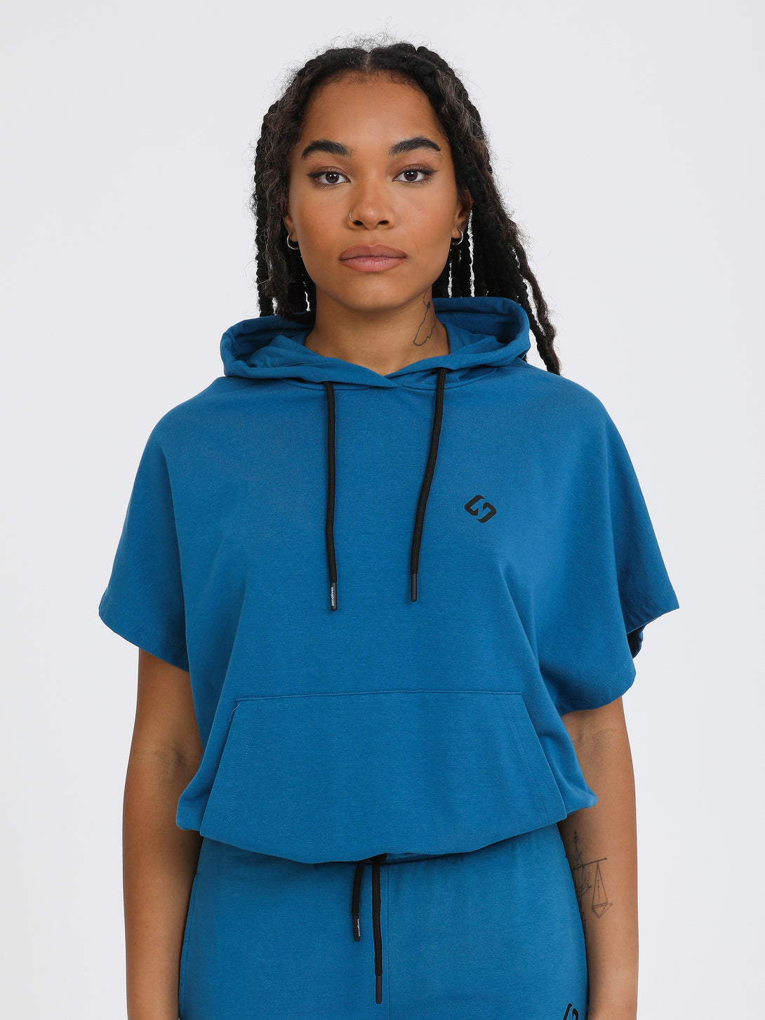 A Woman Wearing Saxony Blue Color All-Day Essential Sweatshirt