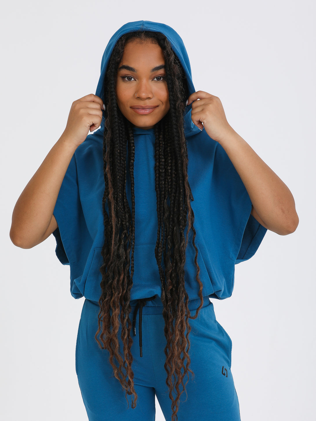 A Woman Wearing Saxony Blue Color All-Day Essential Sweatshirt