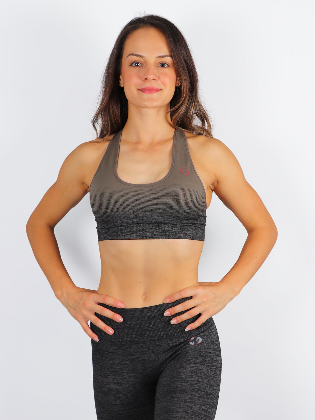A woman wearing Khaki color Seamless Ombre Medium Support Sports Bra