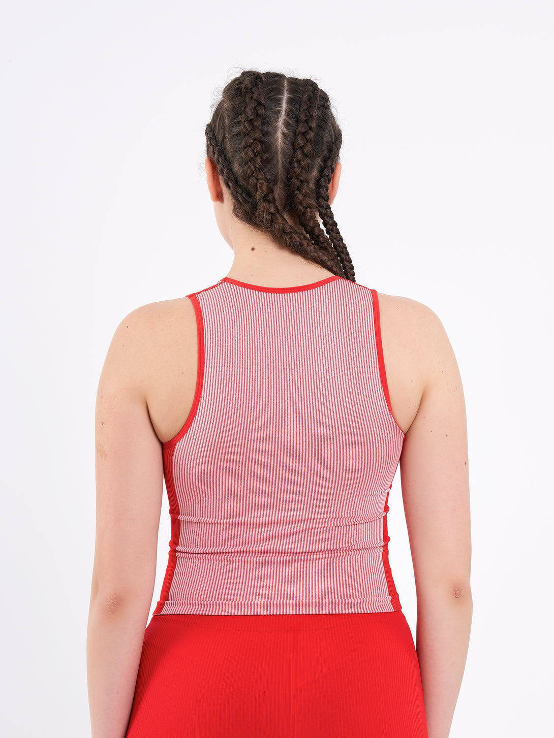 A Woman Wearing Bright Red Color Easy-Move Seamless Ribbed Crop Top for All-Day Wear