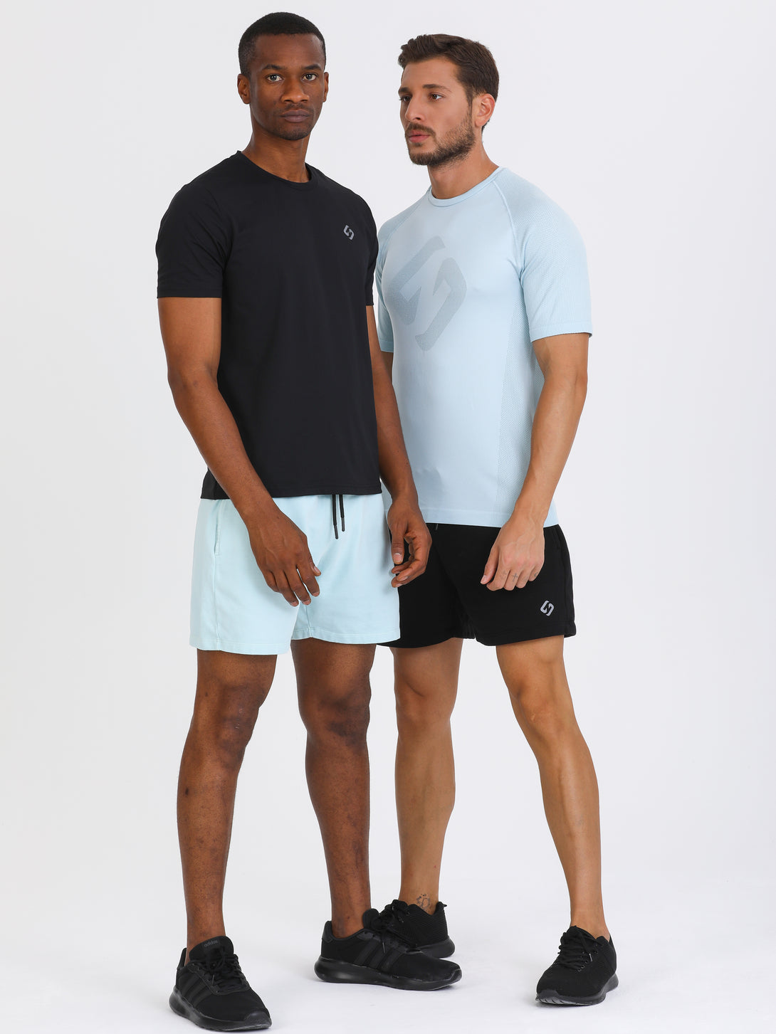 A Man Wearing Baby Blue Color Essential Mens Workout Shorts