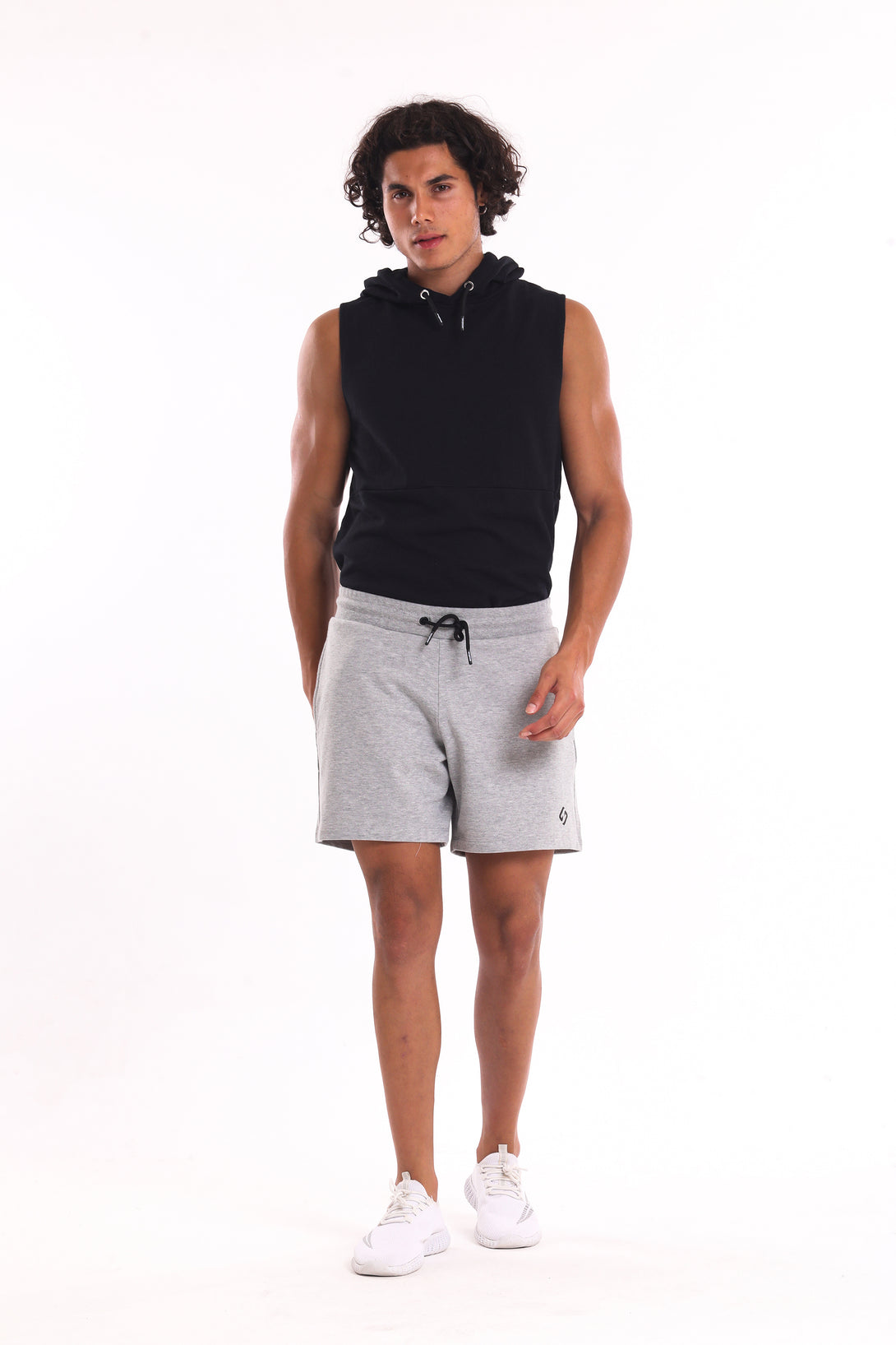 A Man Wearing Light Grey Melange Color Essential Mens Workout Shorts