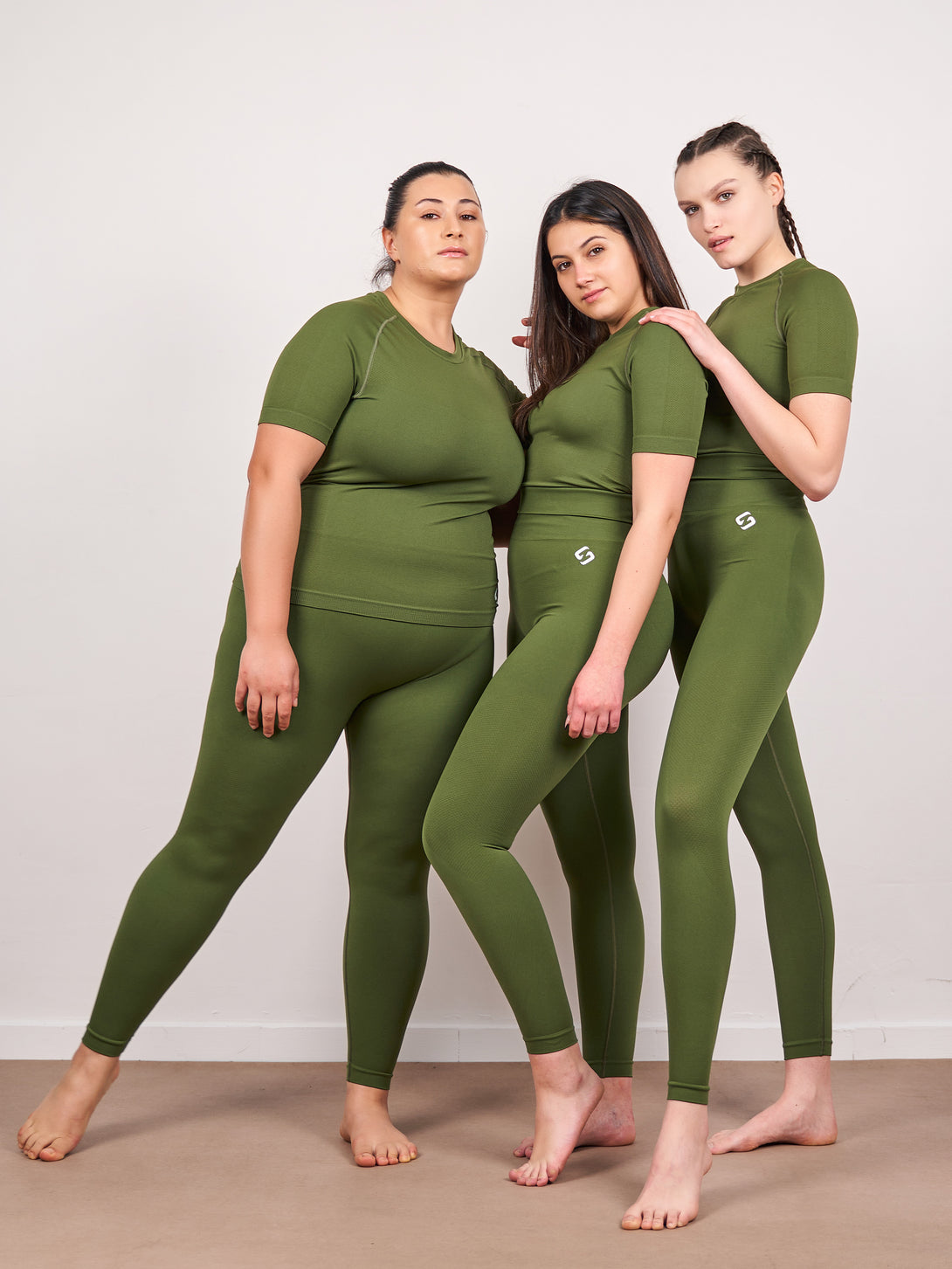 A Women Wearing Zen Khaki Color Zen Confidence Seamless Compressive Leggings. Body-Shaping