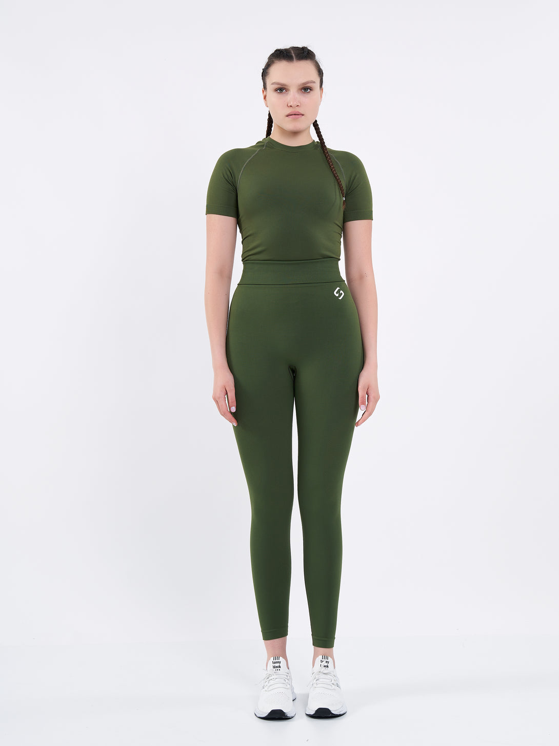 A Women Wearing Zen Khaki Color Zen Confidence Seamless Compressive Leggings. Body-Shaping