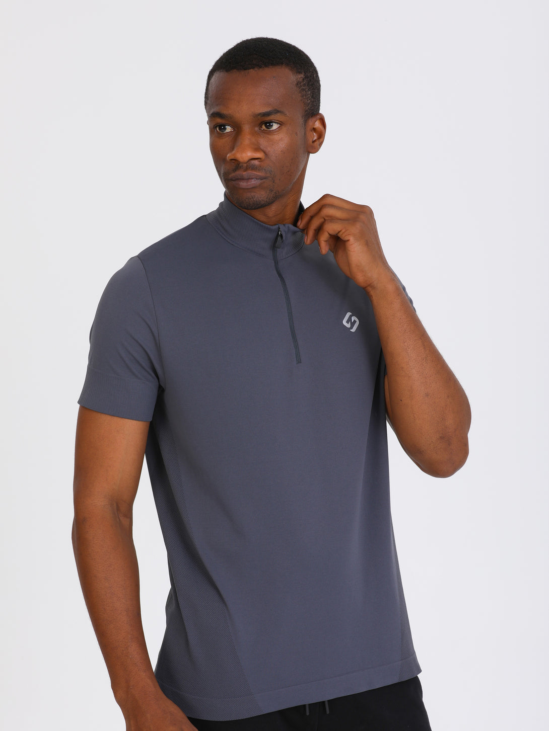 A Man Wearing Ebony Color Seamless Short Sleeve Zipped T-Shirt