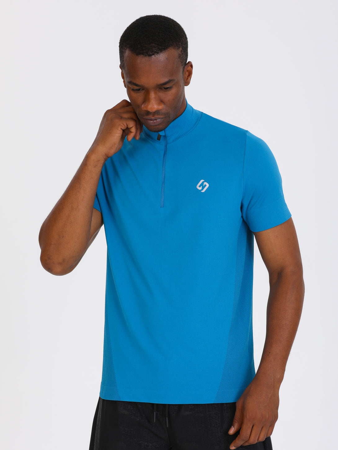 A Man Wearing Saxony Blue Color Seamless Short Sleeve Zipped T-Shirt