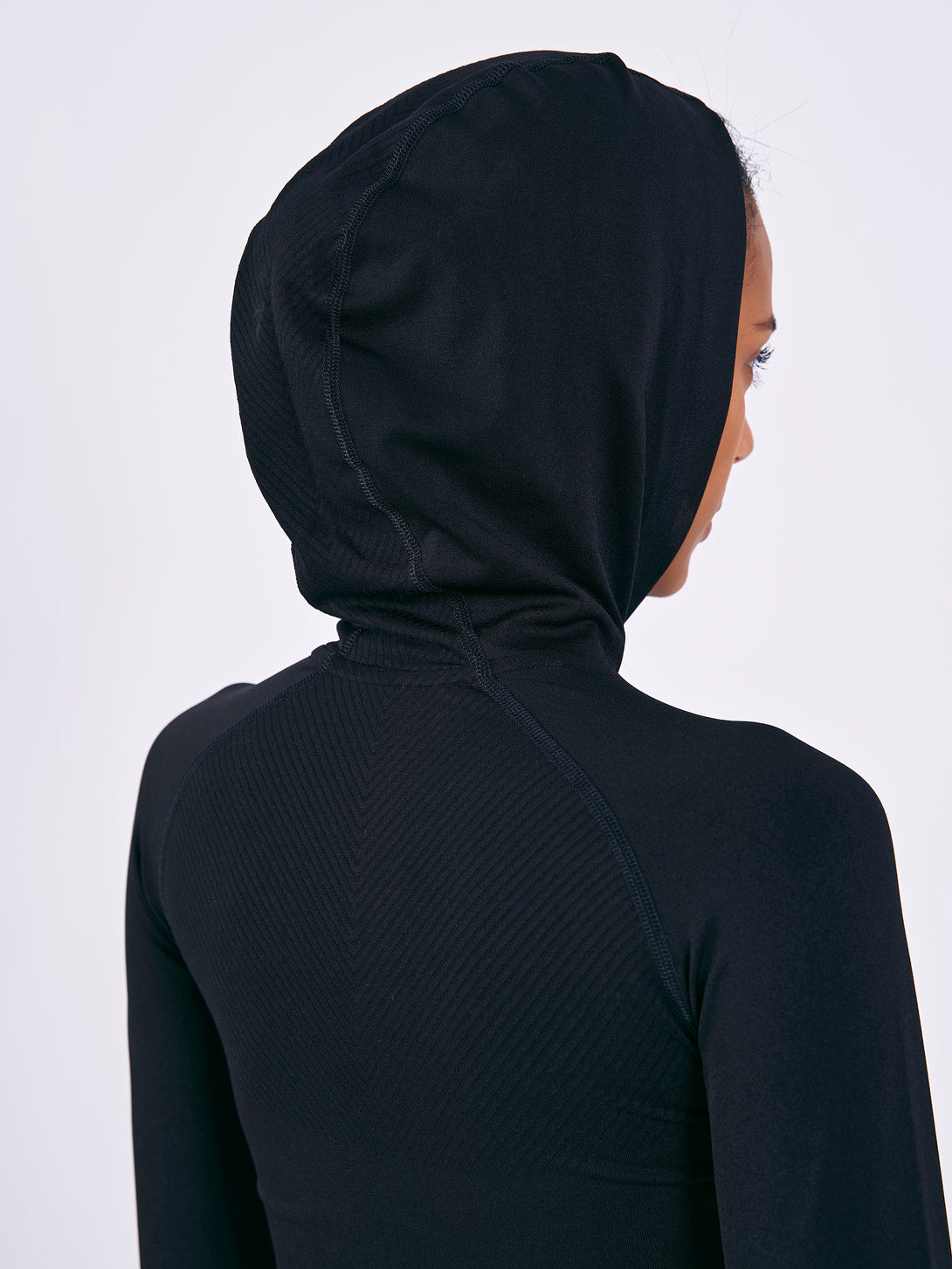 A Woman Wearing Deep Black Color Seamless Lightweight Hoodie