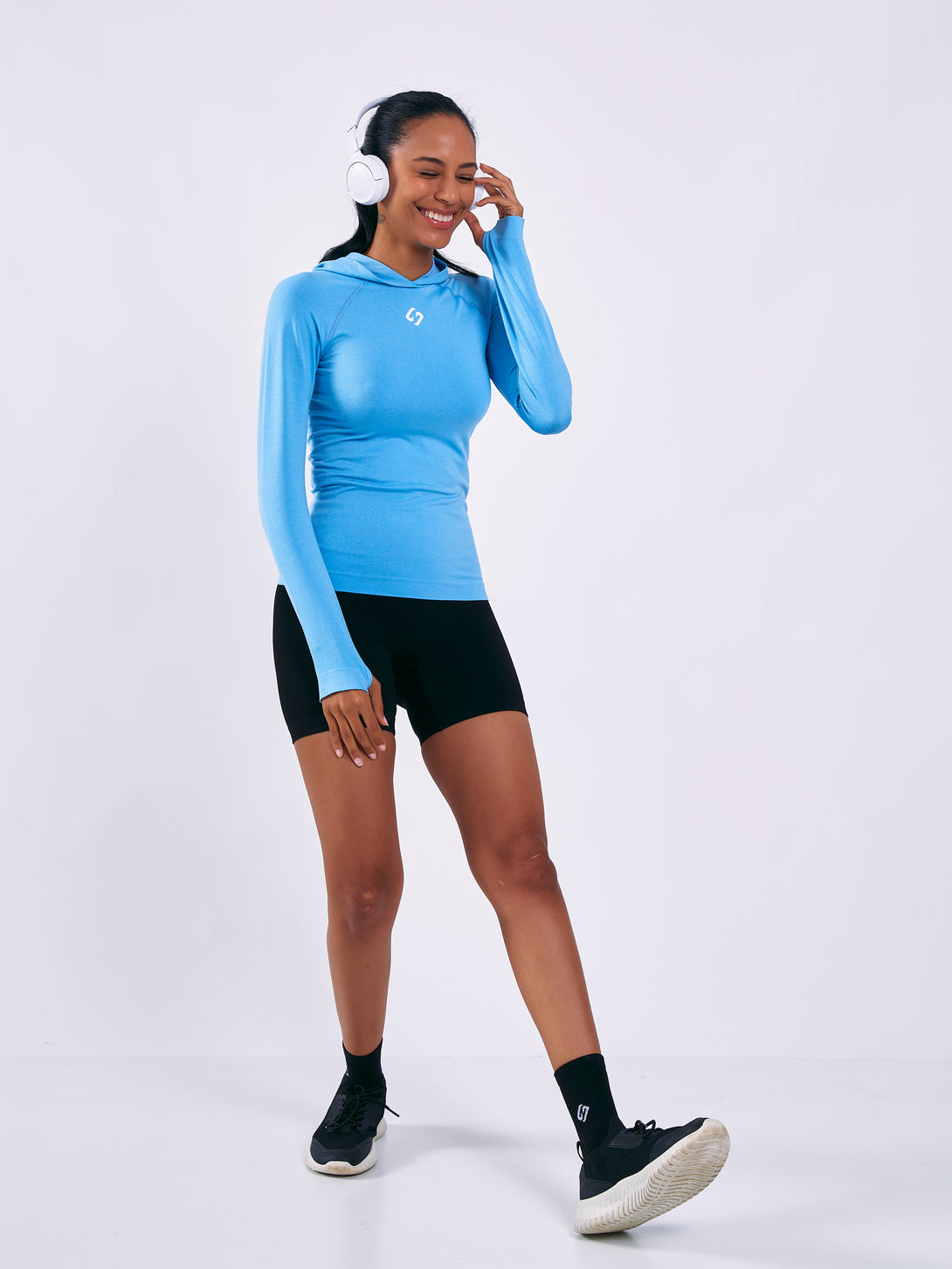 A Woman Wearing Tranquil Blue Color Seamless Lightweight Hoodie