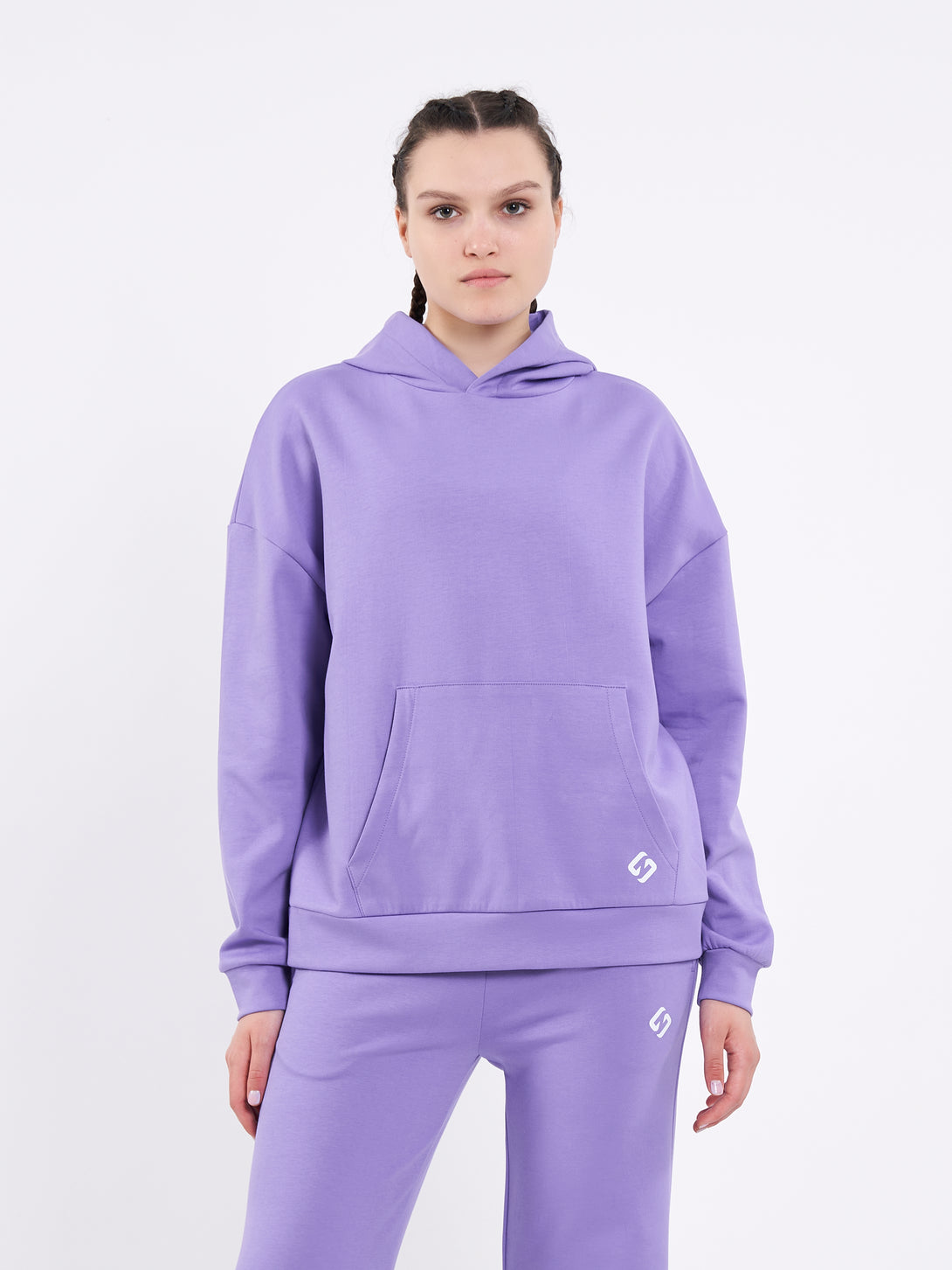 A Woman Wearing Paisley Purple Color Durable Oversized Comfort Hoodie for All-Day Wear