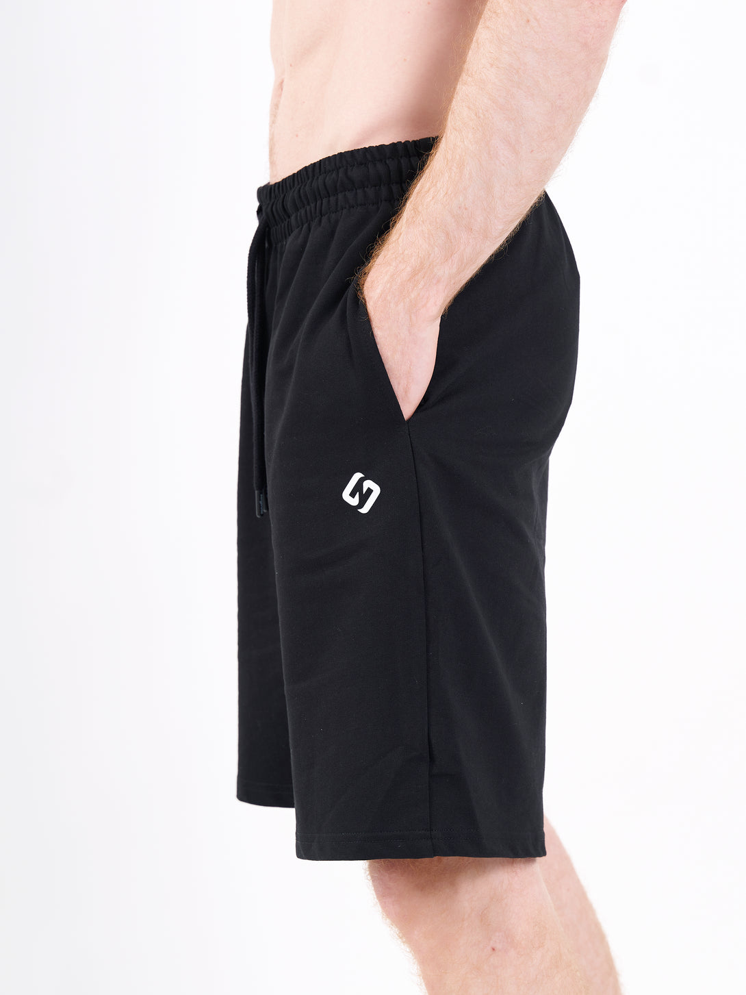 A Man Wearing Deep Black Color Men's Easy-Fit Shorts for All-Day Wear