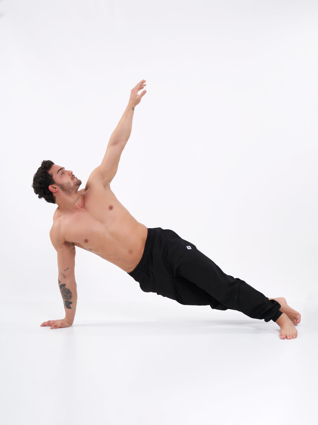 A Man Wearing Deep Black Color Durable Men's Joggers for All-Day Wear
