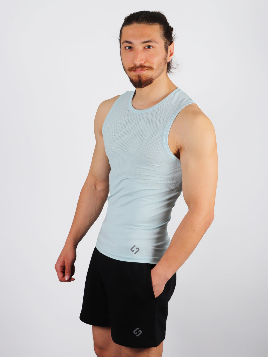 A Man Wearing Baby Blue Color Seamless Mens Mesh Tank Top