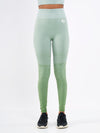 Color_Misty Green | A Women Wearing Misty Green Color Seamless High-Waist Leggings with Ombre Effect. Chic Comfort