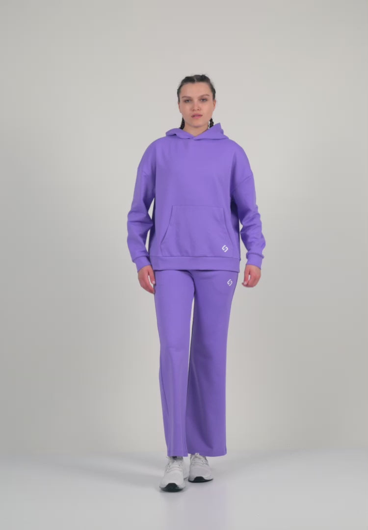A Woman Wearing Paisley Purple Color Durable Oversized Comfort Hoodie for All-Day Wear