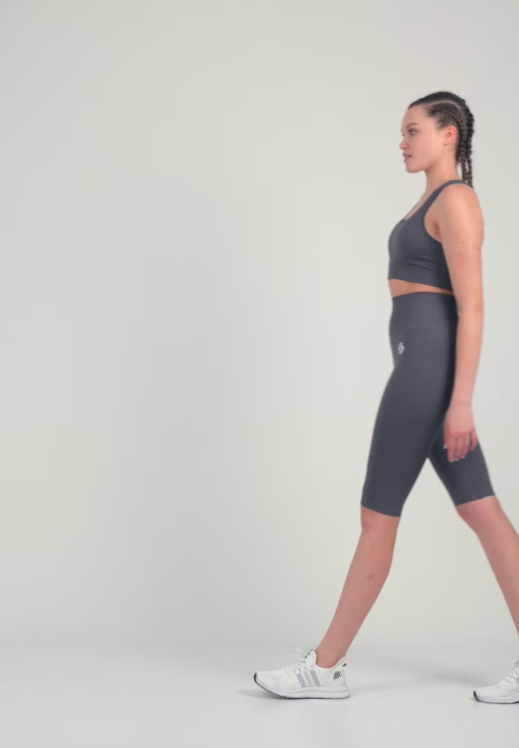 Color_Anthracite | A Woman Anthracite Color Zen Perfect Seamless High-Waist Longline Shorts. Perfect Fit