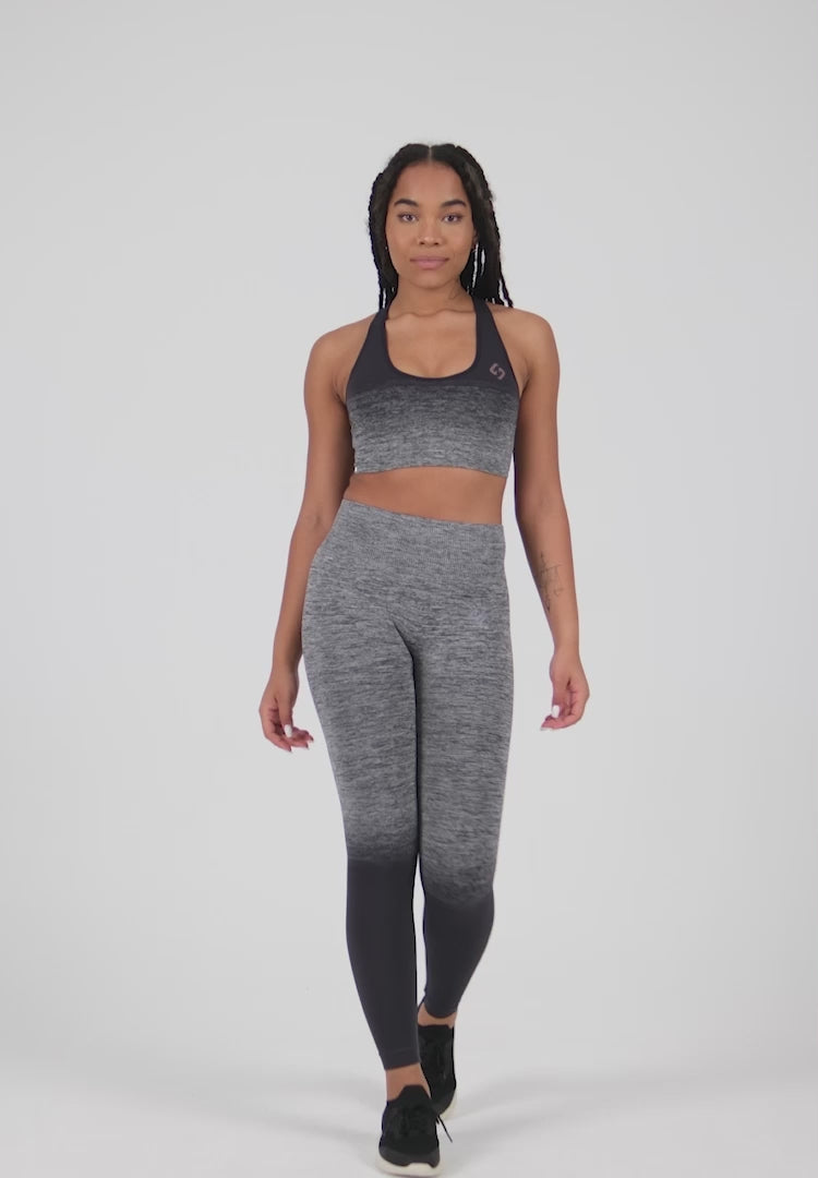A woman wearing Peacoat color Seamless Ombre Medium Support Sports Bra