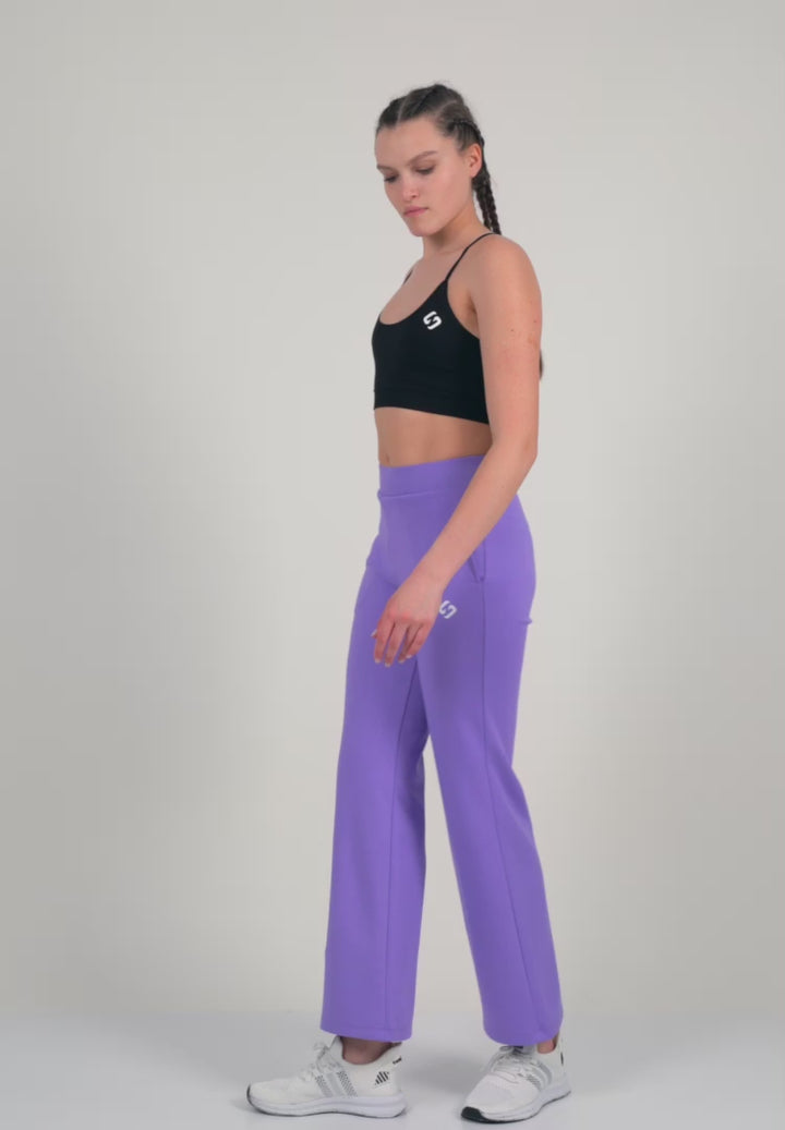 A Woman Wearing Lavender Fields Color Durable Flare-Leg Comfort Joggers for All-Day Wear